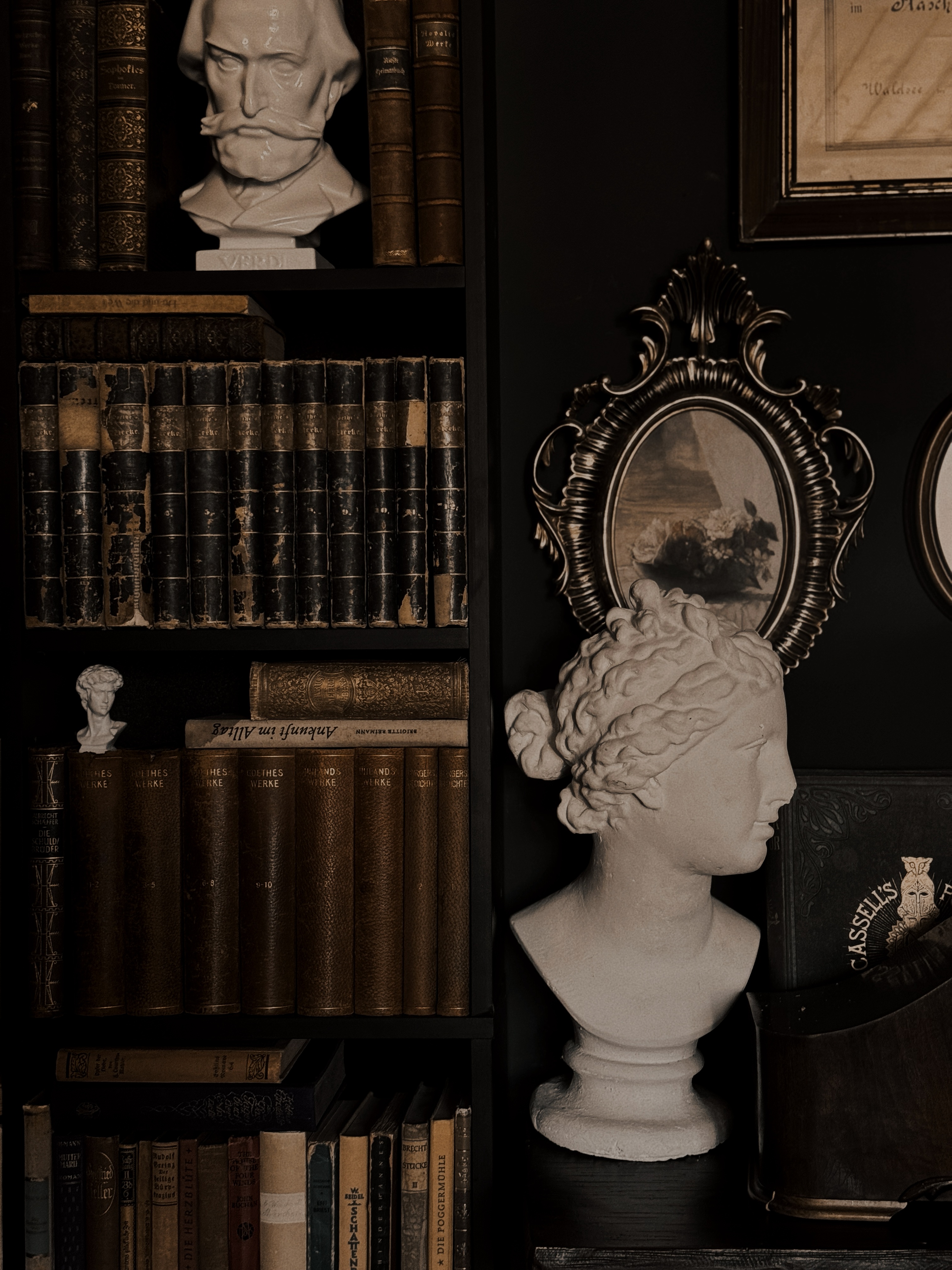 Classical bust and antique books